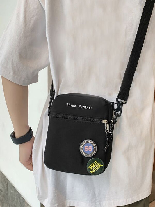 Fashion trend, simple embroidery, letter decoration, sturdy and durable nylon material, casual and versatile men's one shoulder crossbody bag with two badges as a gift