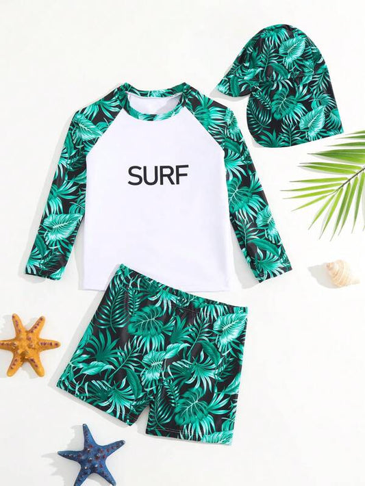 SHEIN Kids SUNSHNE Toddler Boys Tropical Print Beach Swimsuit With Swim Cap