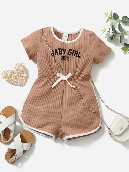 SHEIN Baby Letter Graphic Contrast Binding Knotted Front Romper