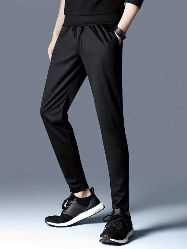 Running Men Solid Slant Pocket Sports Pants