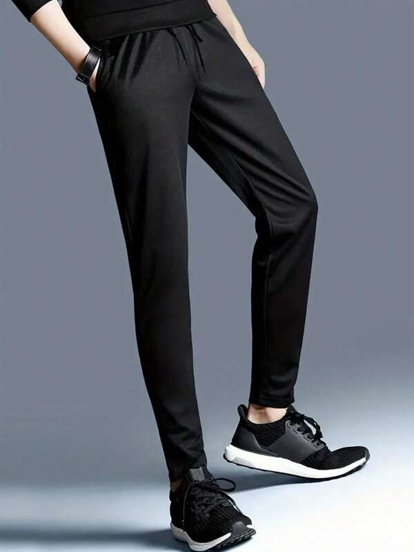 Running Men Solid Slant Pocket Sports Pants