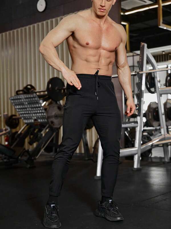 Fitness Men Solid Slant Pocket Sports Pants