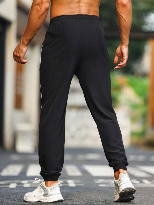 Men Contrast Piping Drawstring Waist Sports Pants