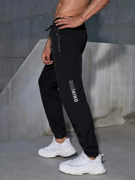 Men Letter Graphic Zip Pocket Drawstring Waist Sports Pants