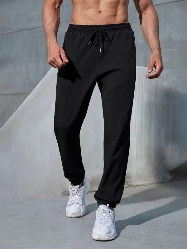 Men Letter Graphic Zip Pocket Drawstring Waist Sports Pants